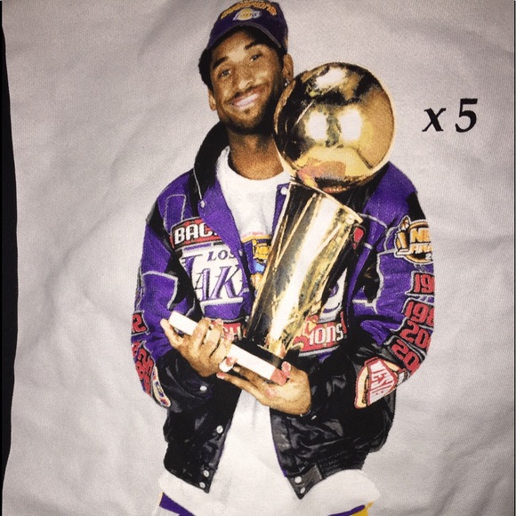 kobe holding trophy shirt